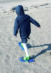 A youngster practices snowshoeing on the sands of the Presque Isle beach during winter