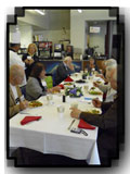 table of people enjoying dining at Sunset Cafe